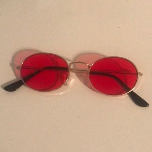 red lens oval sunglasses